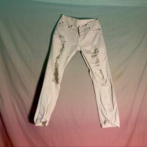 Super distressed white jeans